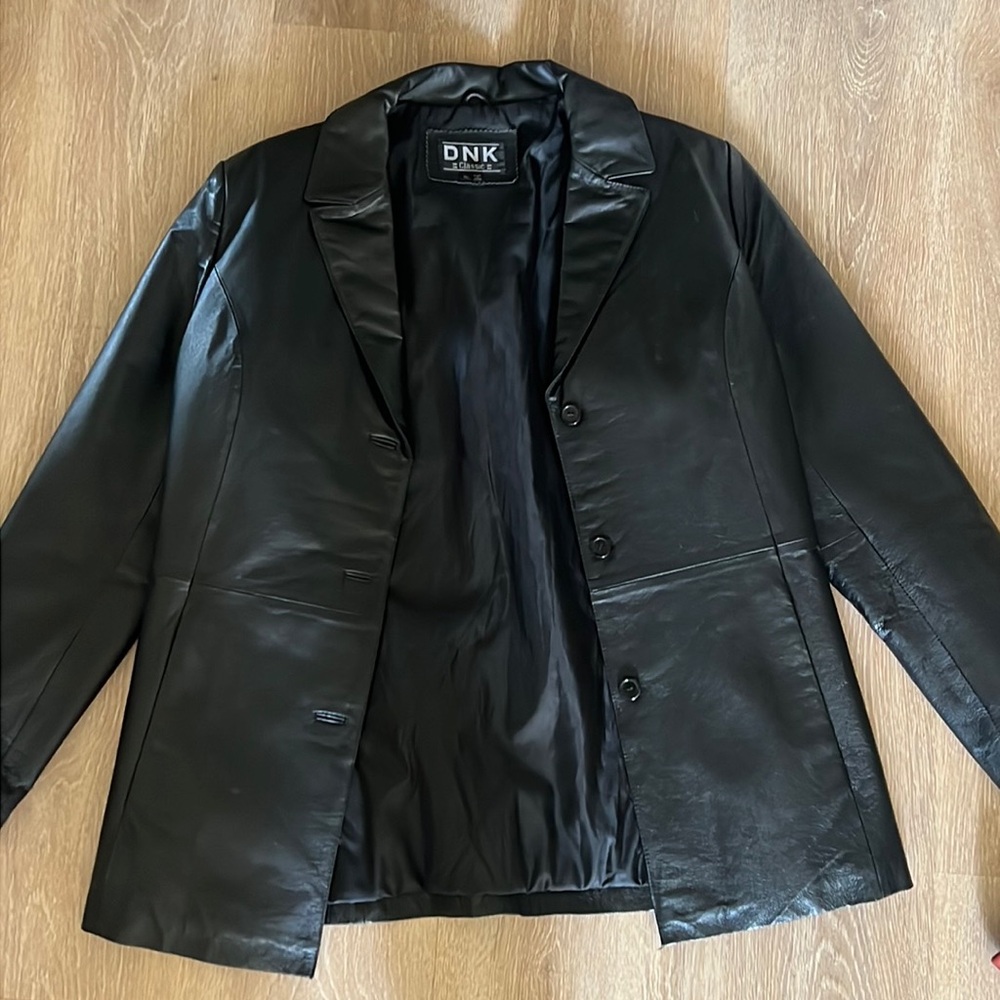 Thick black real leather jacket.